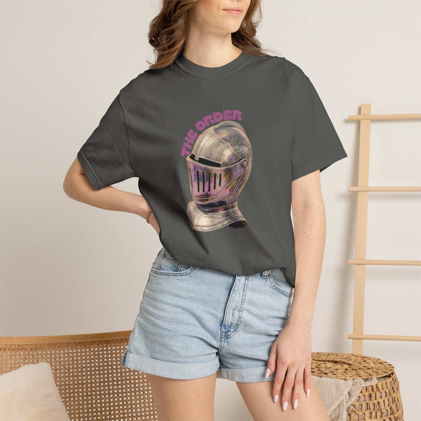 The Order knight helmet shirt worn by female model showing unisex relaxed fit
