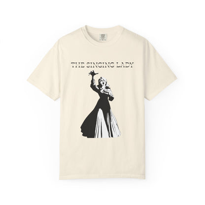 The singing lady tee front view on a heavyweight black cotton shirt
