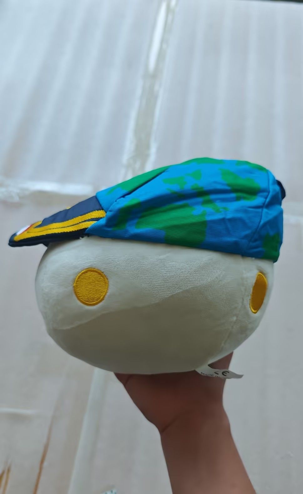 The_stitched_Orion_constellation_featured_prominently_on_the_navy_blue_cap_of_the_Rise_plush.supplier_photo