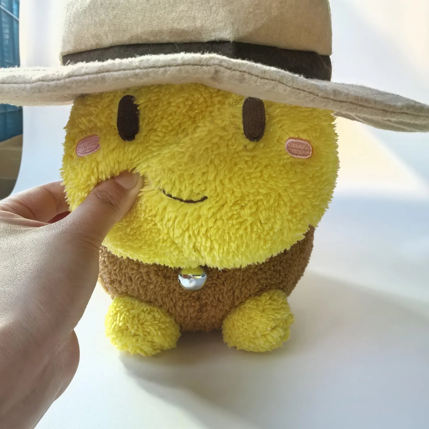 Thomas HWWHP plush displayed on shelf indie game collectible