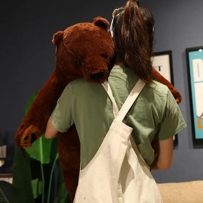 Three sizes of giant simulation bear plush side by side — 40cm, 60cm, and 80cm on a wooden shelf
