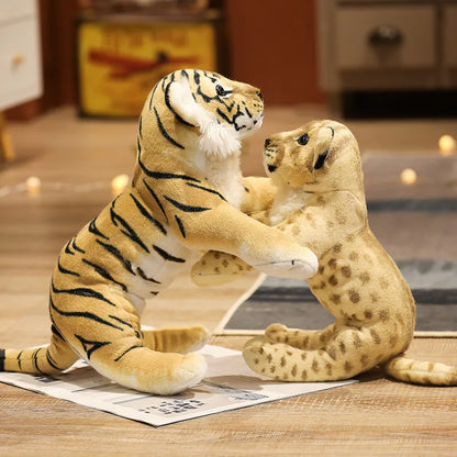 Tiger cub plushies displayed on a shelf as safari themed room decor accent