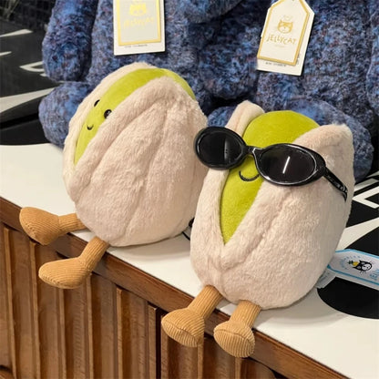 Tiny plushie nut with smiling face