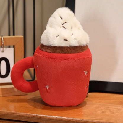 Top view of the hot chocolate plush showing fluffy plush whipped cream topping texture