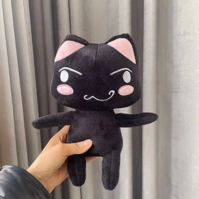 Toro and Kuro cat plushies displayed on gaming desk