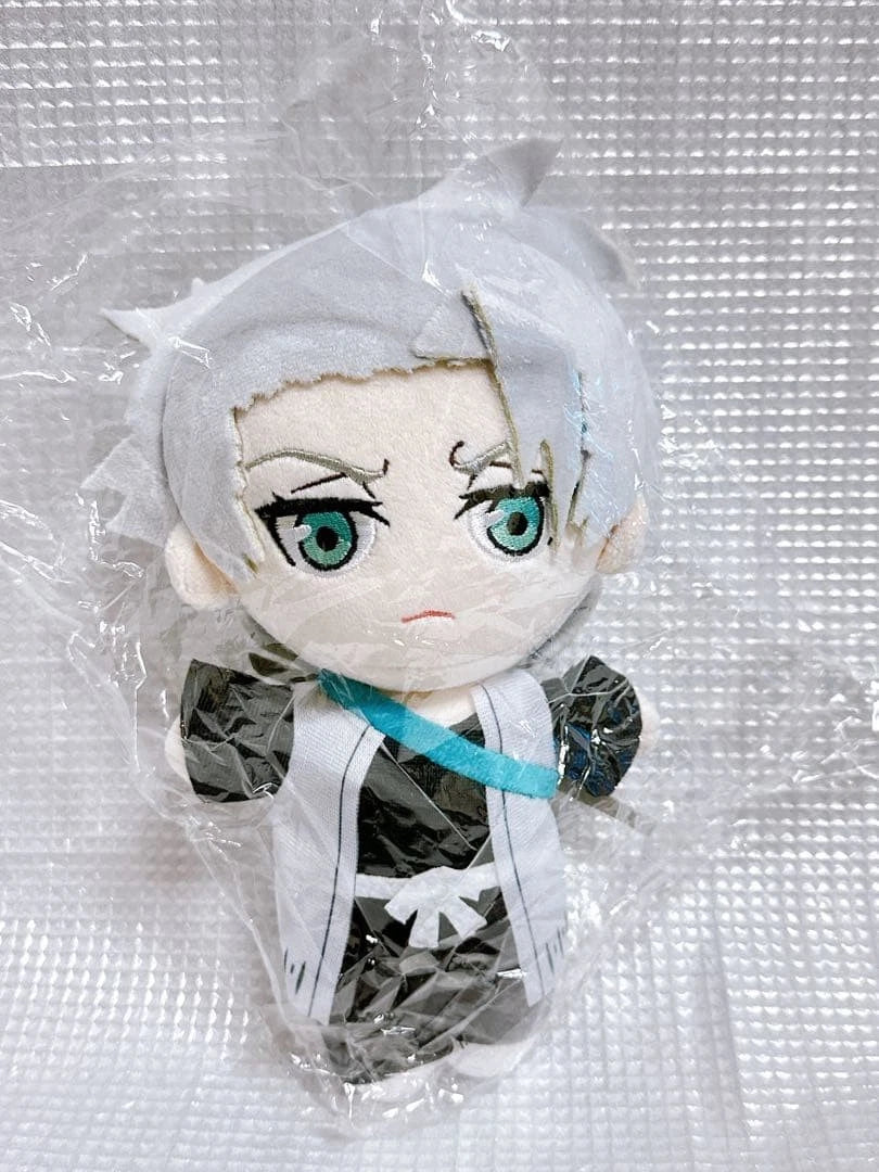 Toshiro Hitsugaya plush displayed on desk anime collectible shelf