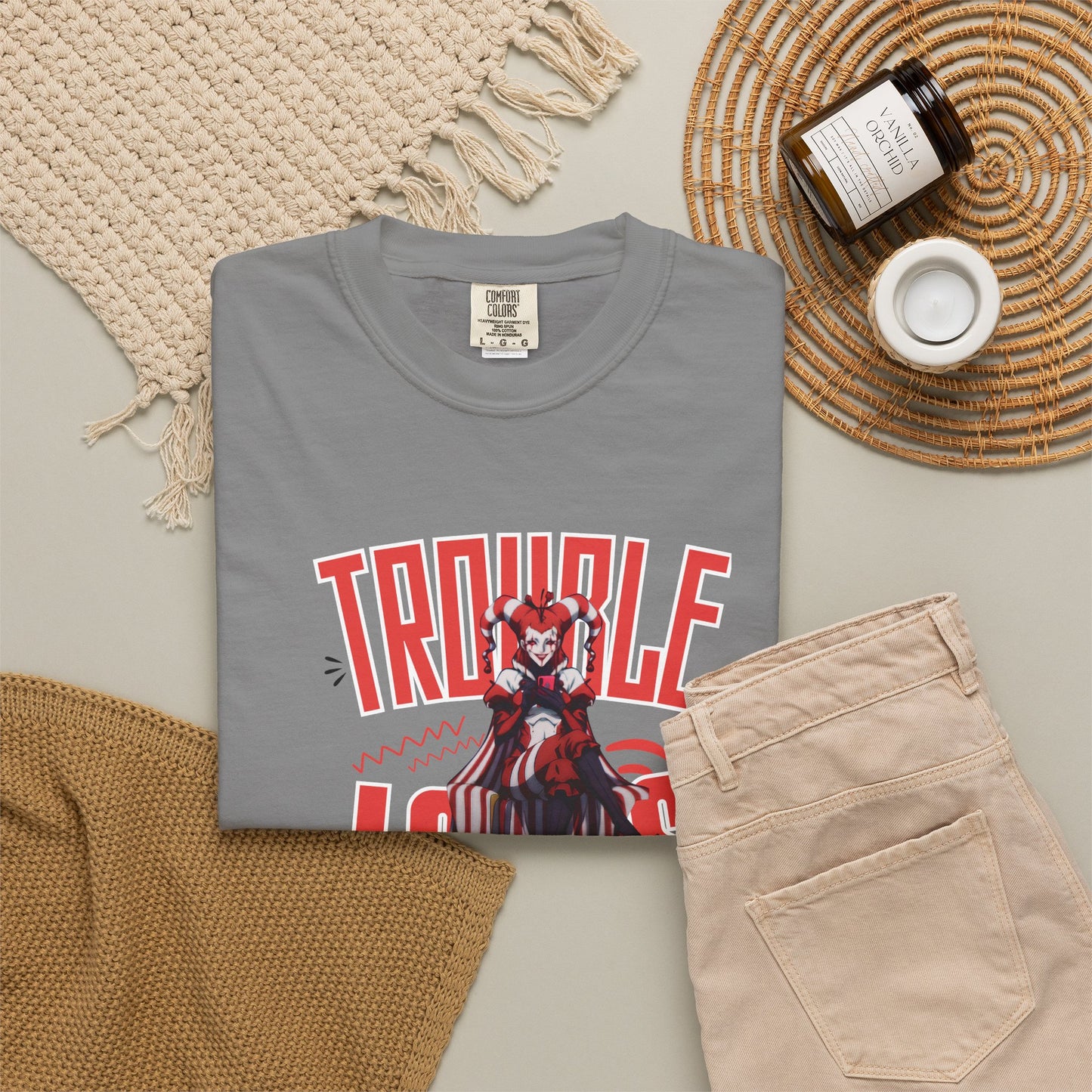 Trouble Looks Good On Me tee worn at a concert venue, crowd background, casual night look

