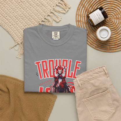 Trouble Looks Good On Me tee worn at a concert venue, crowd background, casual night look
