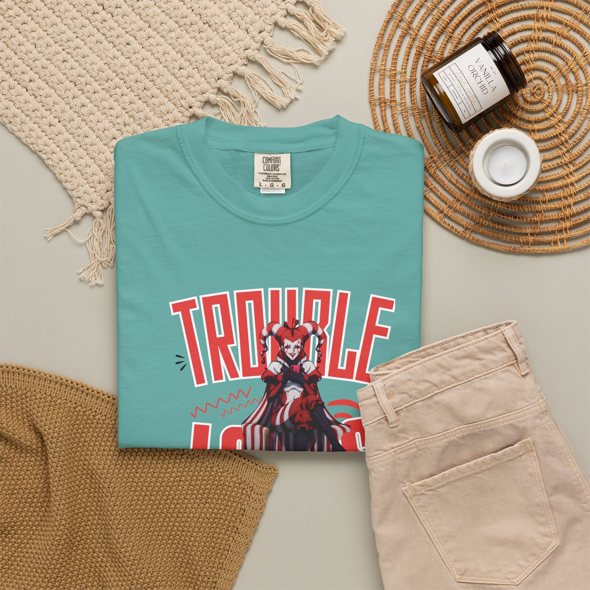 Trouble Looks Good On Me tee worn with baggy cargo pants and bucket hat, full streetwear outfit
