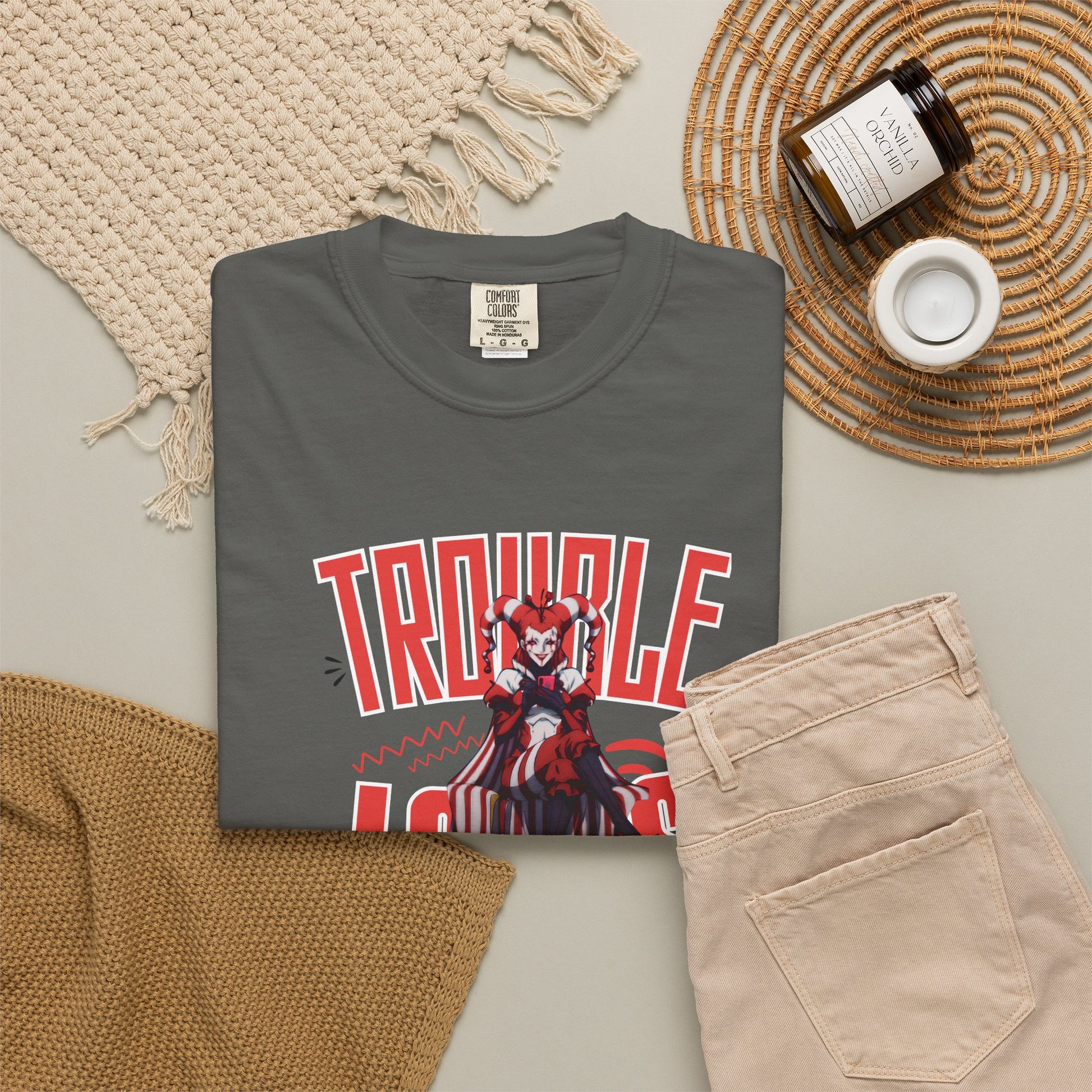 Trouble looks good on me tees arranged in all available sizes S through 3XL on flat surface
