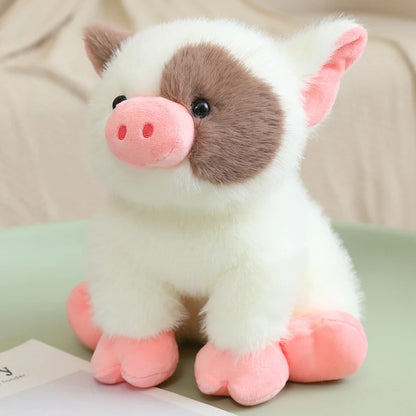 Two colorways of handmade pig plush side by side, pink white spotted and cream kawaii piglet gift