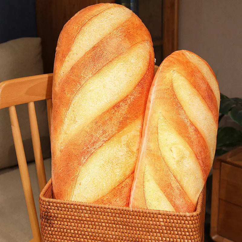 Two loaves of bread in a woven basket with a blurred background