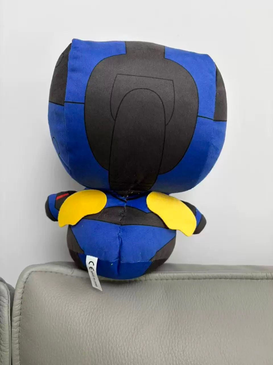 ULTRAKILL v1 plush and v2 plush set plush together on a shelf
