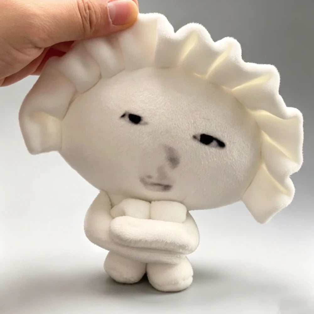 Ugly cute plush keychain 10cm size comparison in hand