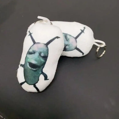 Uncanny Meme Bag Charm 12cm size comparison next to hand