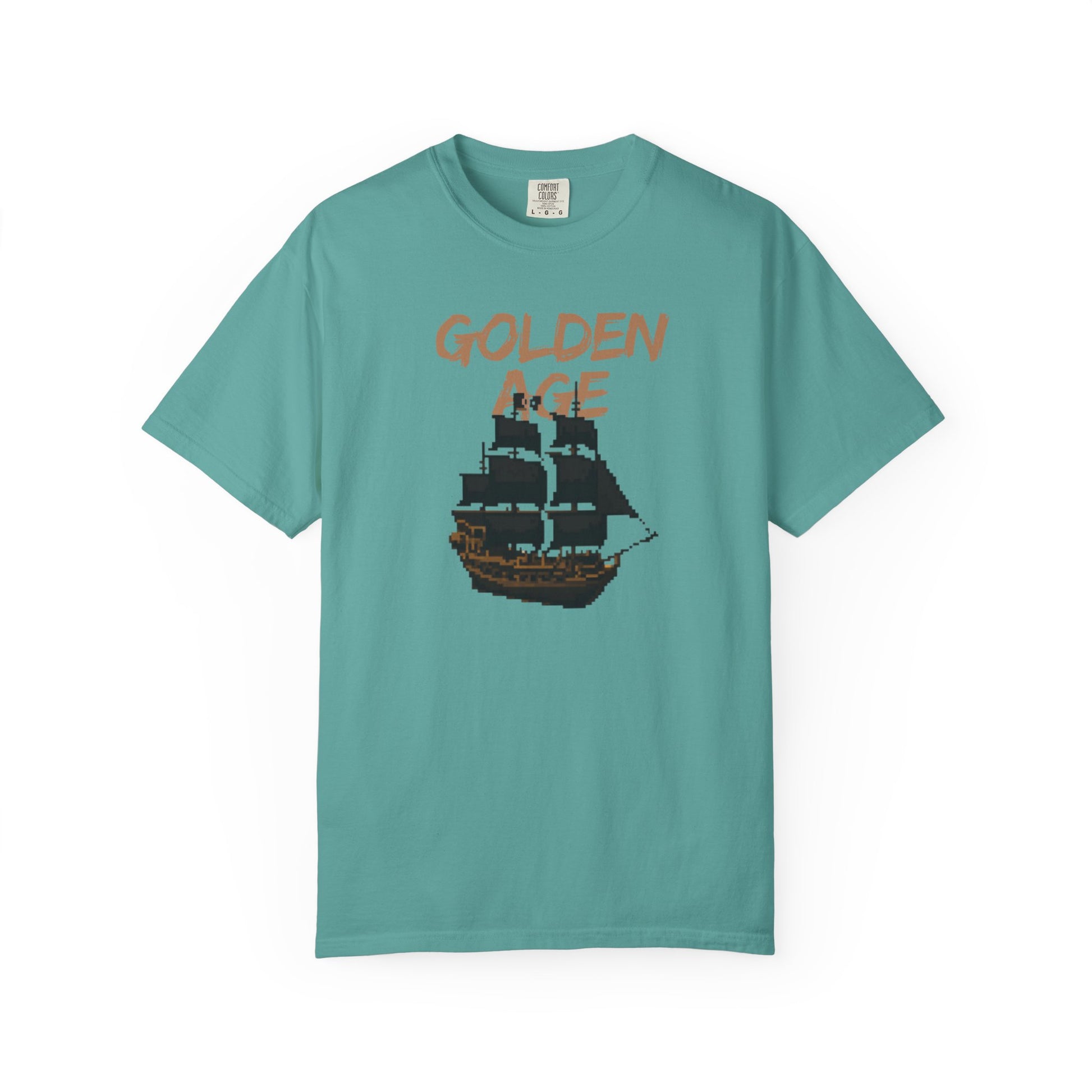 Unisex pirate ship graphic tee flat lay on a weathered wood surface
