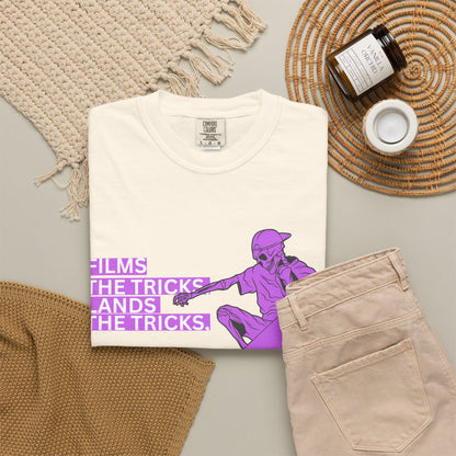 Urban graphic tee with skateboarder print worn over flannel layer