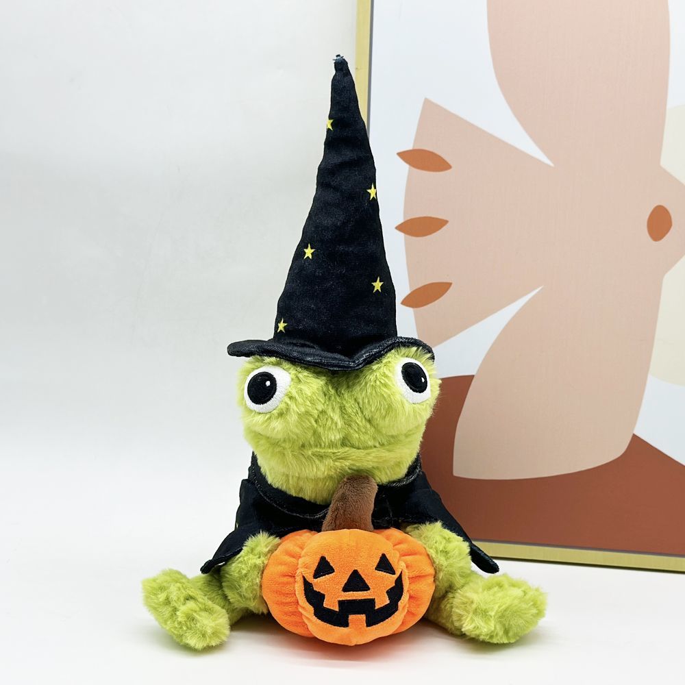 Viral wizard frog plush sitting upright on Halloween shelf display with seasonal decor