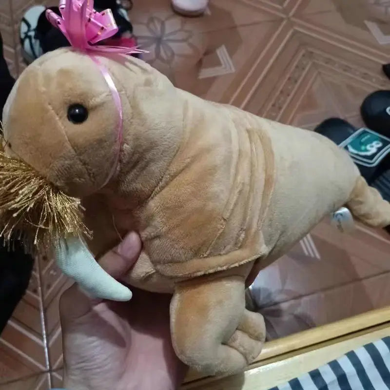 Walrus stuffed animal close up of face highlighting bushy vibrissae whiskers