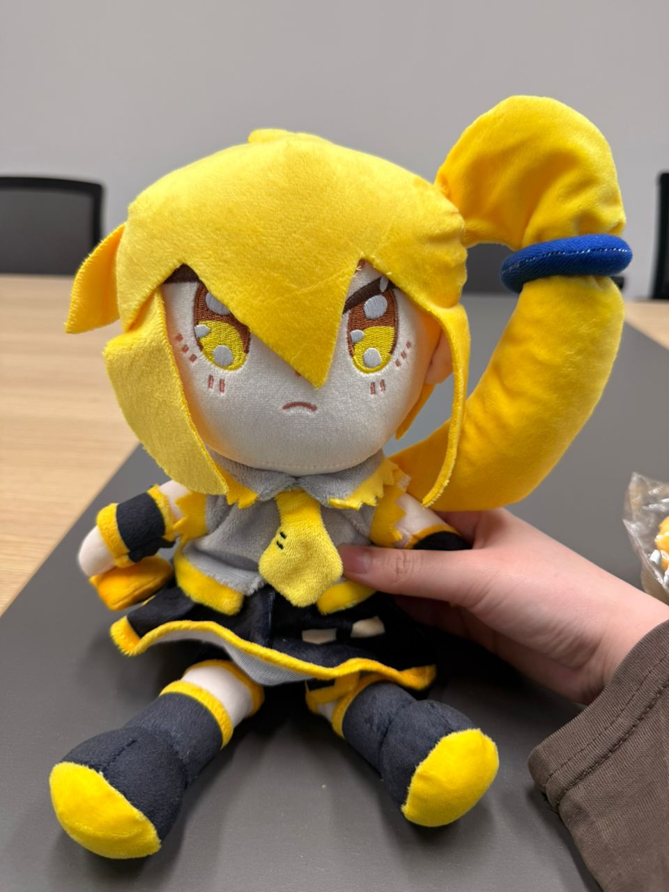Warm golden abstract design reflecting Akita Neru's yellow visual identity and the no voicebank paradox in 2026 Vocaloid culture