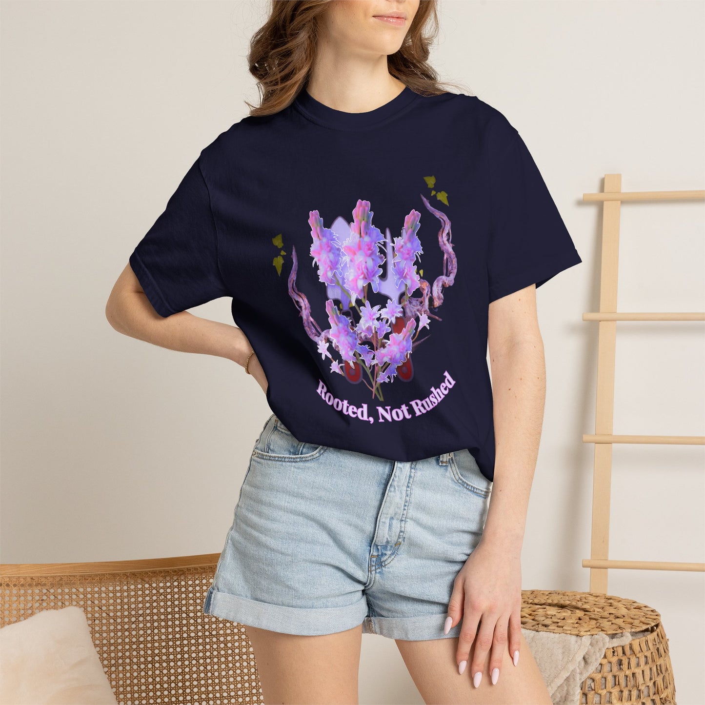 Watercolor floral affirmation tee folded flat lay with dried lavender and violet blooms