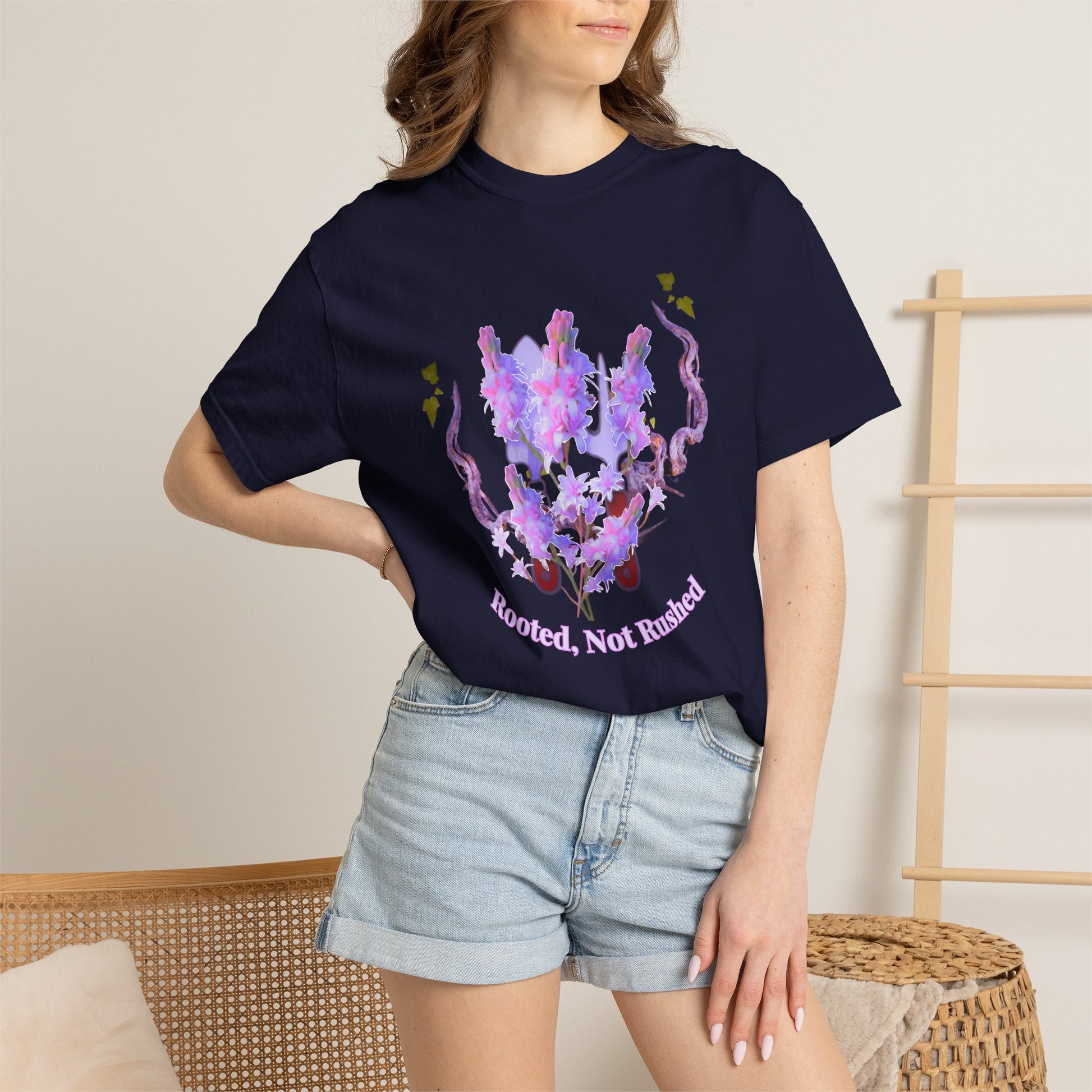 Watercolor floral affirmation tee folded flat lay with dried lavender and violet blooms