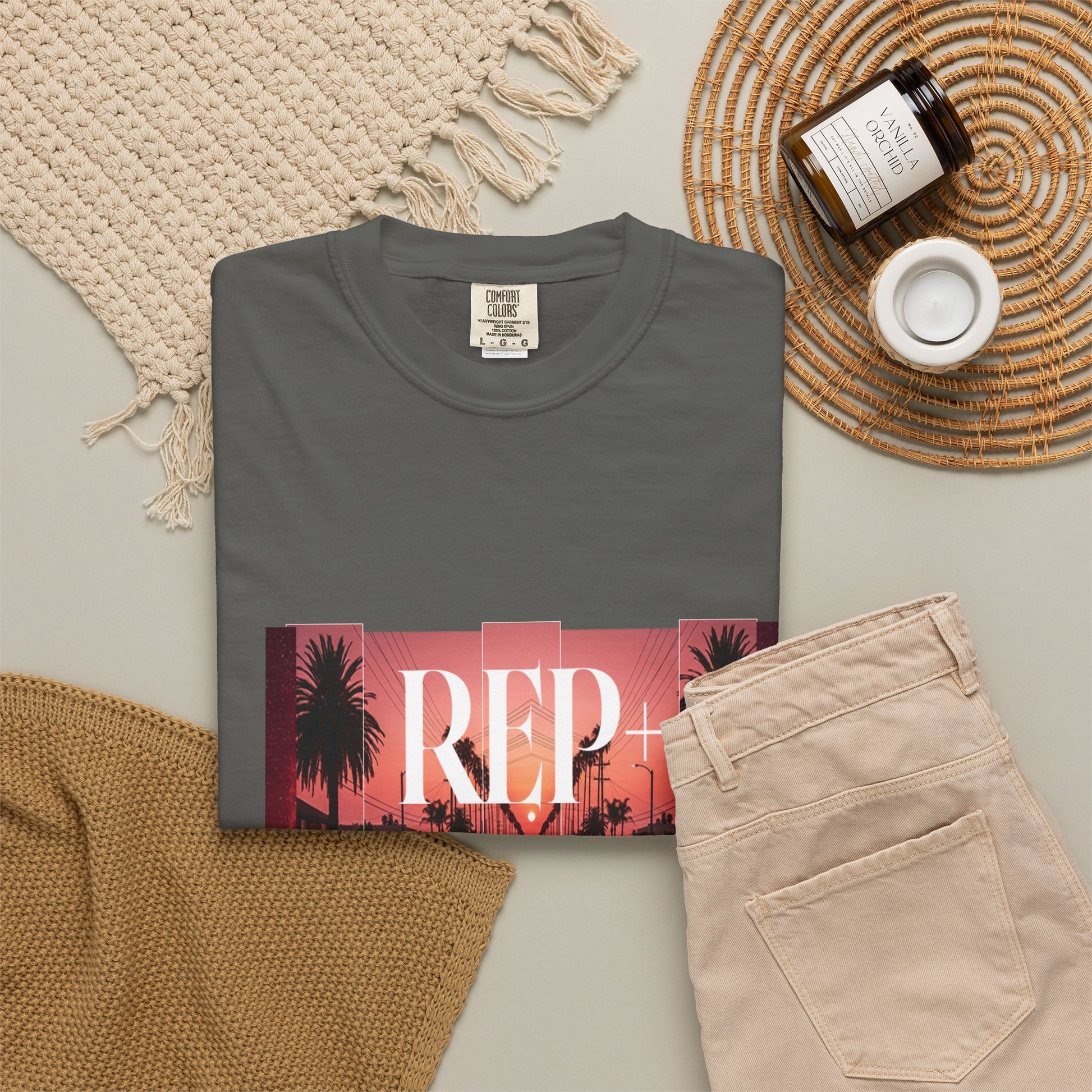 West Coast streetwear tee with retro red muscle car and neon-toned sky print