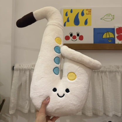 White and brown 20cm saxophone pendant plush variants flat lay top view