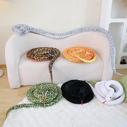 White snake plushie large realistic python stuffed animal on bed