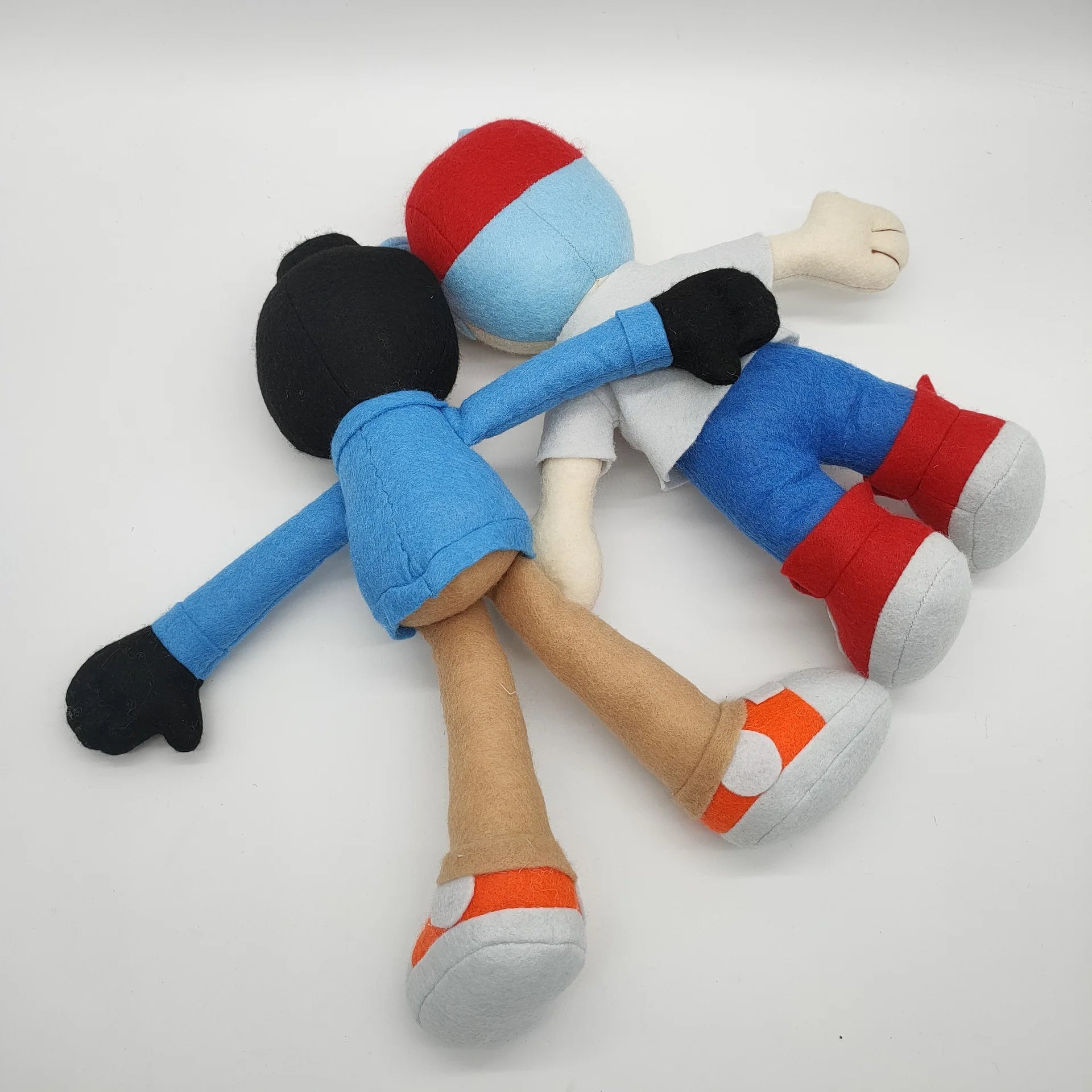 Whitty and Boyfriend fan-inspired plush toys displayed together
