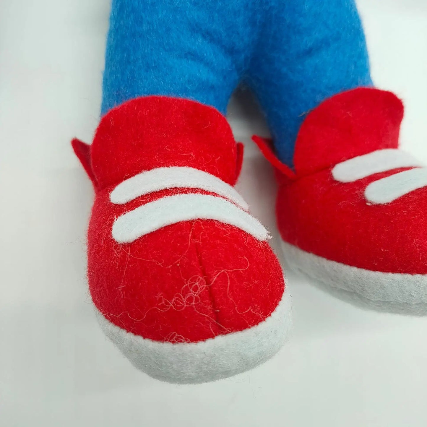 Whitty plush PP Cotton filled handmade stuffed toy, side view
