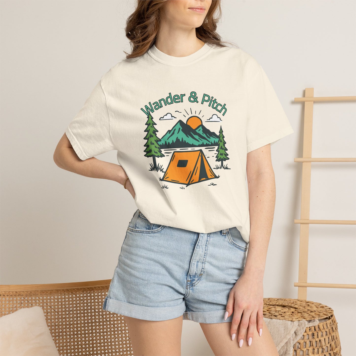 Wilderness graphic unisex tee folded neatly in a professional studio