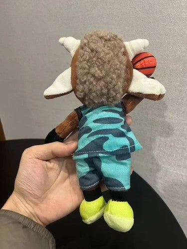 Will Harris plush held in hand showing 24cm size comparison, smalls can ball stuffed animal
