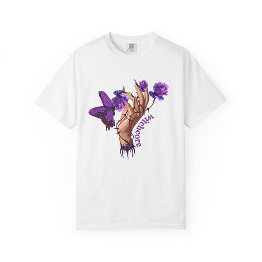 Witchcore t-shirt with mystical hand holding purple roses and butterfly graphic