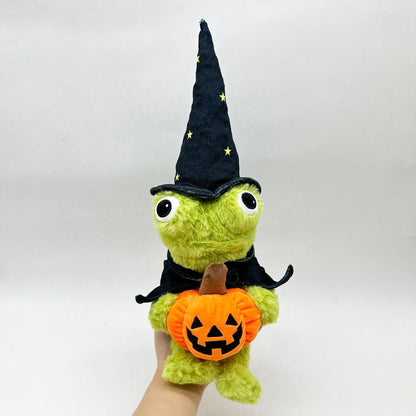 Wizard frog Halloween plush displayed on wooden bookshelf with autumn seasonal decor