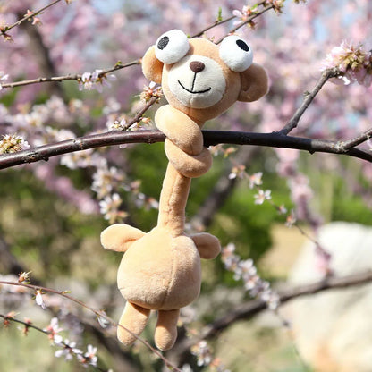 animal plush backpack charm coiled around bag strap lifestyle photo