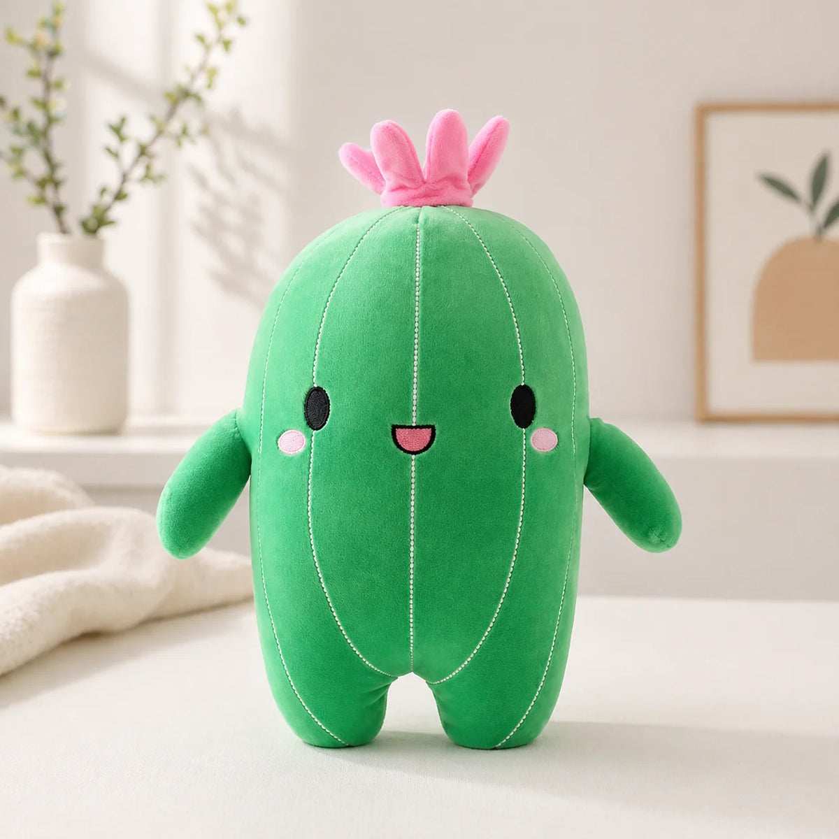 cactus stuffed pillow against a pastel background