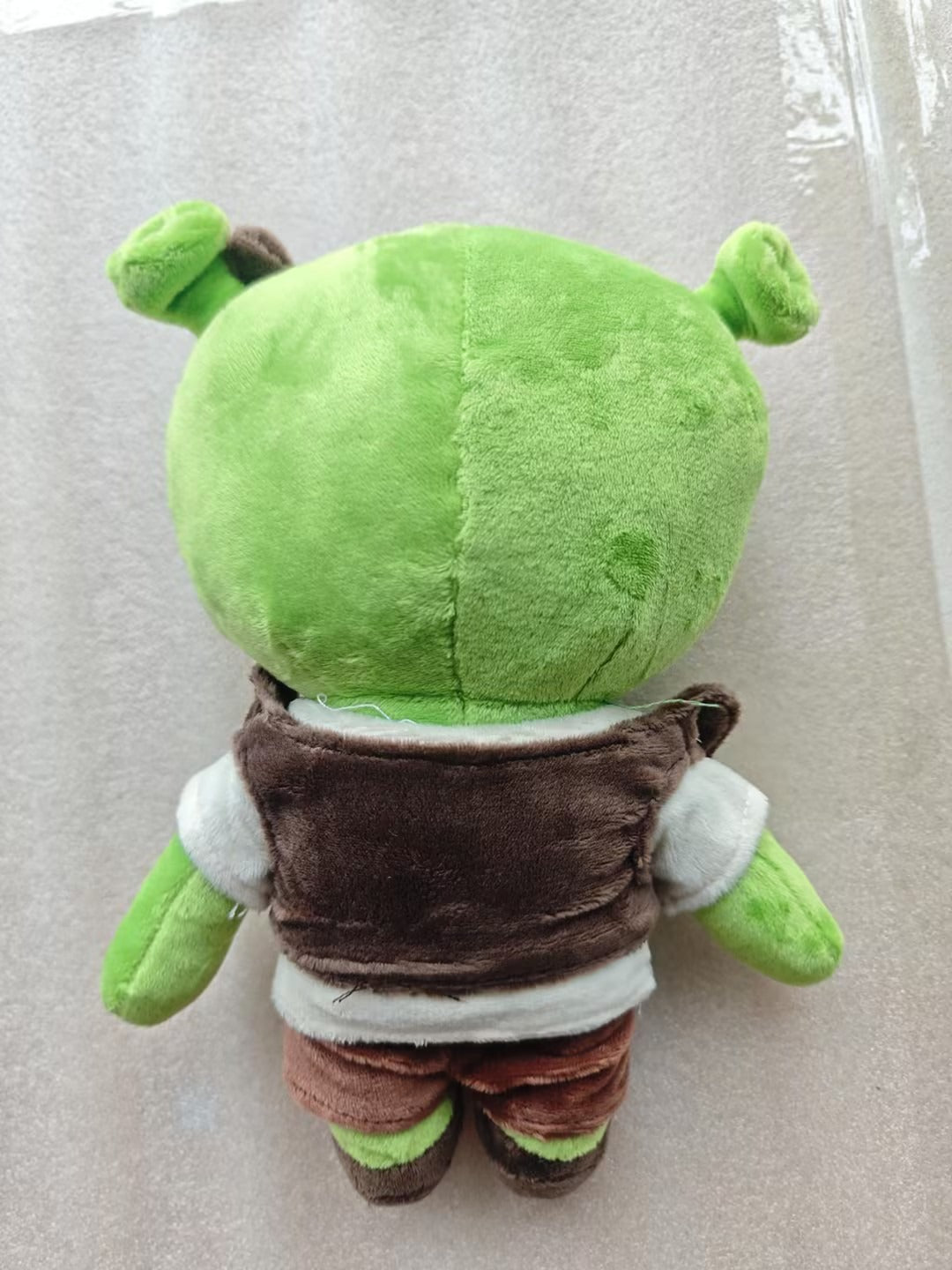 green shrek hello kitty plush