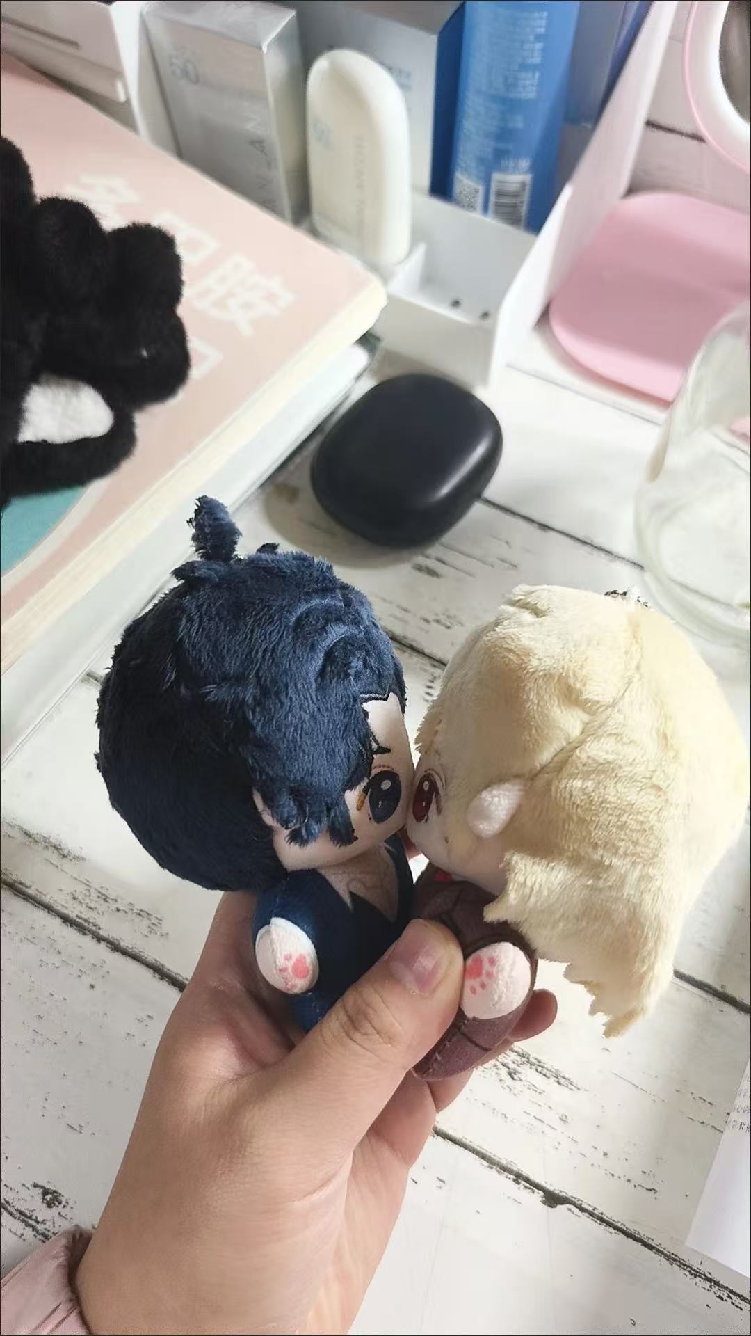 handmade anime plush soft embroidered face detail close up
