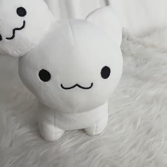 Radical Rat stuffed plush holding a small cartoon bomb