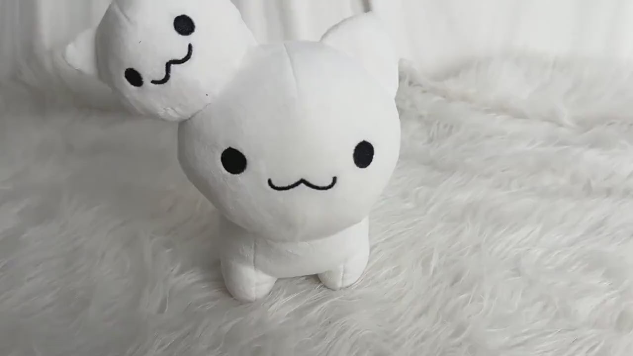 Radical Rat stuffed plush holding a small cartoon bomb