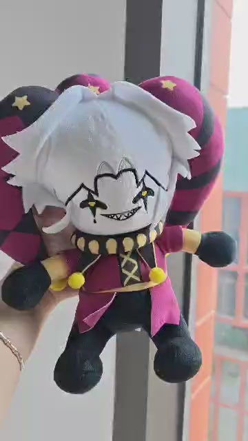 A soft, handmade 25cm harlequin pierrot doll, blending cute and horror aesthetics from visual novels, presented professionally on a seamless white surface.