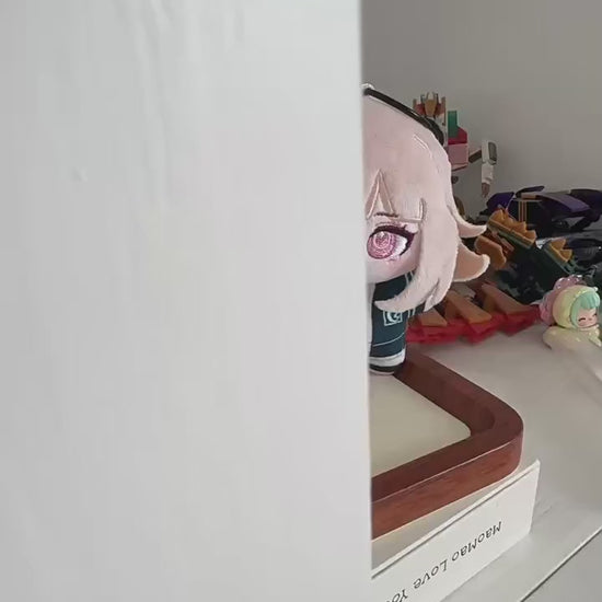 Three fan-inspired mystery visual novel chibi plushies displayed on shelf
