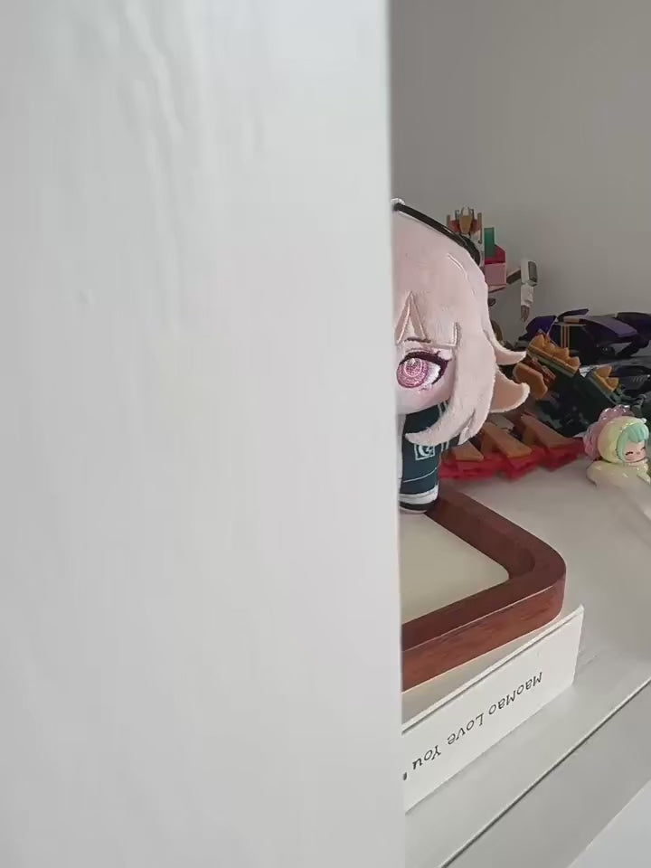Three fan-inspired mystery visual novel chibi plushies displayed on shelf
