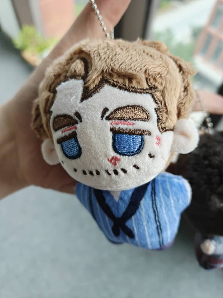 side view of aurthur morgan plushie 